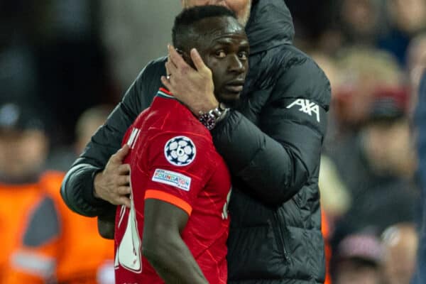 LIVERPOOL, ENGLAND - Wednesday, April 13, 2022: Liverpool's manager Jürgen Klopp embraces Sadio Mané as he is substituted during the UEFA Champions League Quarter-Final 2nd Leg game between Liverpool FC and SL Benfica at Anfield. (Pic by David Rawcliffe/Propaganda)