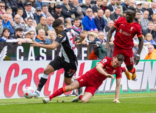 NEWCASTLE-UPON-TYNE, ENGLAND - Saturday, April 30, 2022: Newcastle United's Bruno Guimarães is tackled by Liverpool's James Milner during the FA Premier League match between Newcastle United FC and Liverpool FC at St James' Park. (Pic by David Rawcliffe/Propaganda)