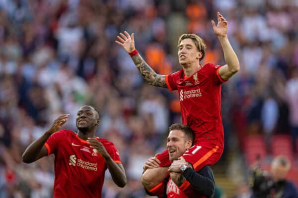 LONDON, ENGLAND - Saturday, May 14, 2022: Liverpool's Kostas Tsimikas celebrates on the shoulders of goalkeeper Adrián San Miguel del Castillo after the FA Cup Final between Chelsea FC and Liverpool FC at Wembley Stadium. The game ended in a goal-less draw, Liverpool won 6-5 on penalties. (Pic by David Rawcliffe/Propaganda)