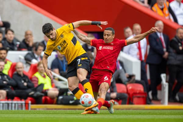 LIVERPOOL, ENGLAND - Sunday, May 22, 2022: Wolverhampton Wanderers' Pedro Neto (L) is challenged by Liverpool's Thiago Alcântara during the FA Premier League match between Liverpool FC and Wolverhampton Wanderers FC at Anfield. (Pic by David Rawcliffe/Propaganda)