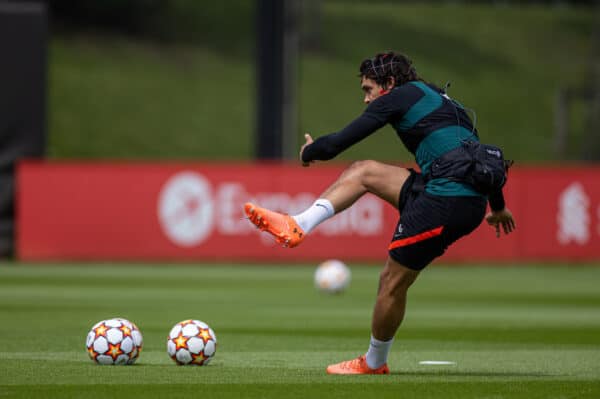 LIVERPOOL, ENGLAND - Wednesday, May 25, 2022: Liverpool's Trent Alexander-Arnold takes a free-kick wearing sensors on his head from Neuro during a training session at the AXA Training Centre ahead of the UEFA Champions League Final game between Liverpool FC and Real Madrid CF. (Pic by David Rawcliffe/Propaganda)