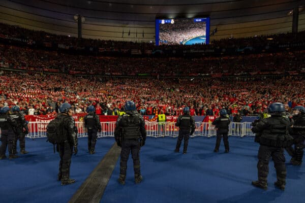 PARIS, FRANCE - Saturday, May 28, 2022: French riot police stand in front of Liverpool supporters wearing body armor and carrying tear gas and guns during the UEFA Champions League Final game between Liverpool FC and Real Madrid CF at the Stade de France. (Photo by David Rawcliffe/Propaganda)