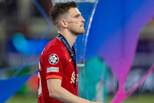 PARIS, FRANCE - Saturday, May 28, 2022: Liverpool's Andy Robertson walks past the trophy during the UEFA Champions League Final game between Liverpool FC and Real Madrid CF at the Stade de France. (Photo by David Rawcliffe/Propaganda)