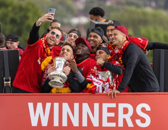 LIVERPOOL, ENGLAND - Sunday, May 29, 2022: Liverpool's goalkeeper Adrián San Miguel del Castillo takes a selfie with his team-mates Diogo Jota, Kostas Tsimikas, Ibrahima Konaté, Fabio Henrique Tavares 'Fabinho', Luis Díaz, Roberto Firmino and Thiago Alcântara along with the two trophies during a parade around the city after the club won the Cup Double, the FA Cup abd Football League Cup. (Photo by David Rawcliffe/Propaganda)