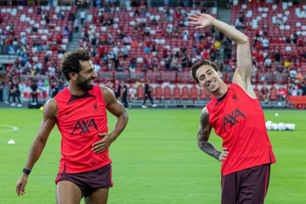 SINGAPORE - Thursday, July 14, 2022: Liverpool's Mohamed Salah (L) and Kostas Tsimikas during a training sessional at the National Stadium, Singapore ahead of the Standard Chartered Trophy pre-season friendly match against Crystal Palace. (Pic by David Rawcliffe/Propaganda)