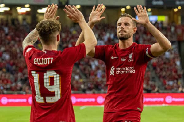 SINGAPORE - Friday, July 15, 2022: Liverpool's captain Jordan Henderson (R) celebrates with team-mate Harvey Elliott (L) after scoring the first goal during the Standard Chartered Trophy pre-season friendly match between Liverpool FC and Crystal Palace FC at the Singapore National Stadium. (Pic by David Rawcliffe/Propaganda)