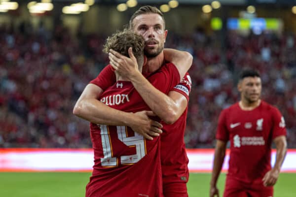 SINGAPORE - Friday, July 15, 2022: Liverpool's captain Jordan Henderson (R) celebrates with team-mate Harvey Elliott (L) after scoring the first goal during the Standard Chartered Trophy pre-season friendly match between Liverpool FC and Crystal Palace FC at the Singapore National Stadium. (Pic by David Rawcliffe/Propaganda)