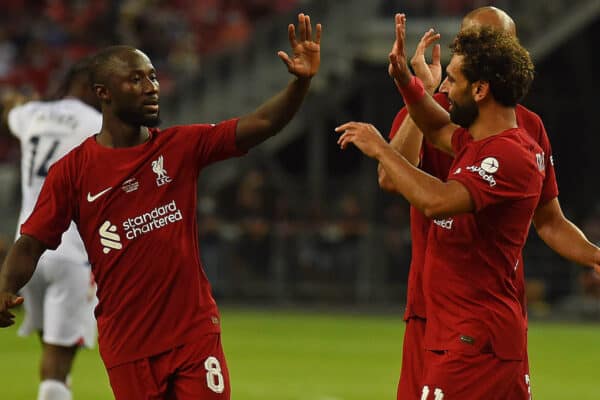 SINGAPORE - Friday, July 15, 2022: Liverpool's Mohamed Salah (R) celebrates with team-mate Naby Keita (L) after scoring the second goal the Standard Chartered Trophy pre-season friendly match between Liverpool FC and Crystal Palace FC at the Singapore National Stadium. (Pic by David Rawcliffe/Propaganda)