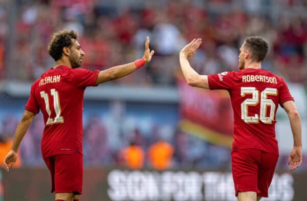 LEIPZIG, GERMANY - Thursday, July 21, 2022: Liverpool's Mohamed Salah (L) celebrates with team-mate Andy Robertson (R) after scoring the first goal during a pre-season friendly match between RB Leipzig and Liverpool FC at the Red Bull Arena. (Pic by David Rawcliffe/Propaganda)