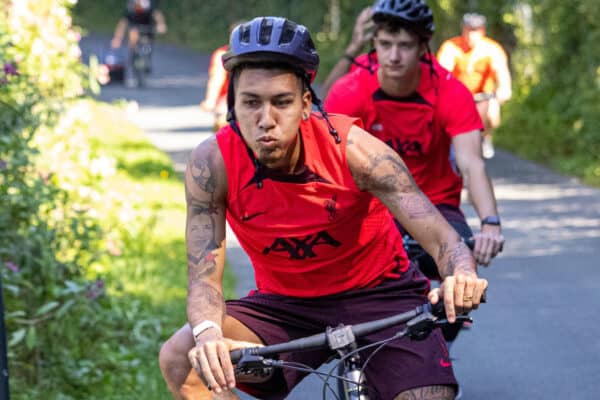 SAALFELDEN, AUSTRIA - Monday, July 25, 2022: Liverpool's Roberto Firmino arriving on a bicycle before a training session at during the club's pre-season training camp in Austria. (Pic by David Rawcliffe/Propaganda)