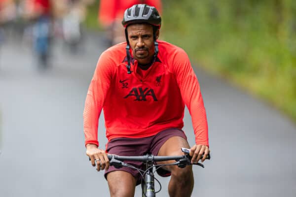 SAALFELDEN, AUSTRIA - Tuesday, July 26, 2022: Liverpool's Joël Matip arrives on a bicycle before a training session at during the club's pre-season training camp in Austria. (Pic by David Rawcliffe/Propaganda)