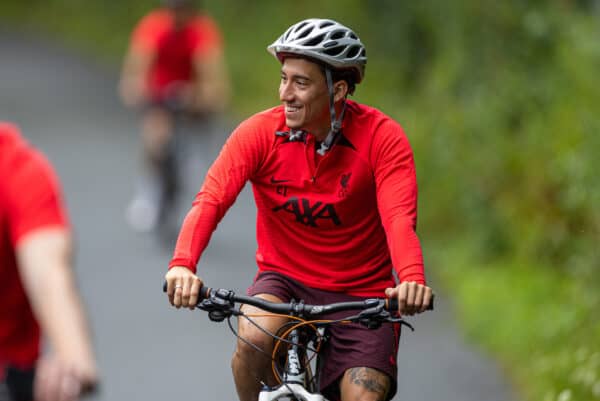 SAALFELDEN, AUSTRIA - Tuesday, July 26, 2022: Liverpool's Kostas Tsimikas arrives on a bicycle before a training session at during the club's pre-season training camp in Austria. (Pic by David Rawcliffe/Propaganda)