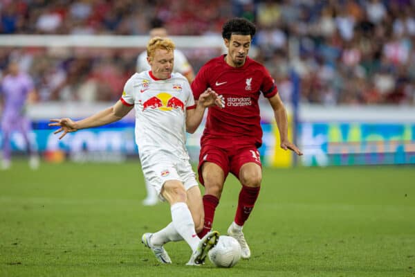 SALZBURG, AUSTRIA - Wednesday, July 27, 2022: Liverpool's Curtis Jones (R) and RB Salzburg's Nicolas Seiwald during a pre-season friendly between FC Red Bull Salzburg and Liverpool FC at the Red Bull Arena. (Pic by David Rawcliffe/Propaganda)