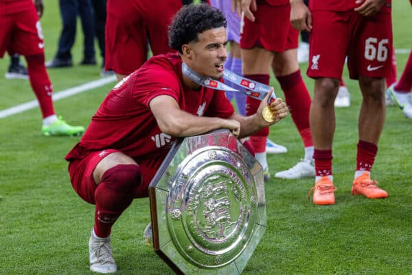 LEICESTER, ENGLAND - Saturday, July 30, 2022: Liverpool's Curtis Jones celebrates with the trophy after the FA Community Shield friendly match between Liverpool FC and Manchester City FC at the King Power Stadium. Liverpool won 3-1. (Pic by David Rawcliffe/Propaganda)