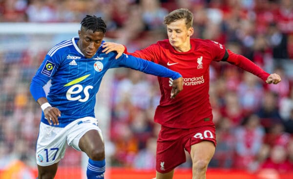 LIVERPOOL, ENGLAND - Sunday, July 31, 2022: RC Strasbourg's Jean-Ricner Bellegarde (L) and Liverpool's Tyler Morton during a pre-season friendly match between Liverpool FC and RC Strasbourg Alsace at Anfield. (Pic by David Rawcliffe/Propaganda)