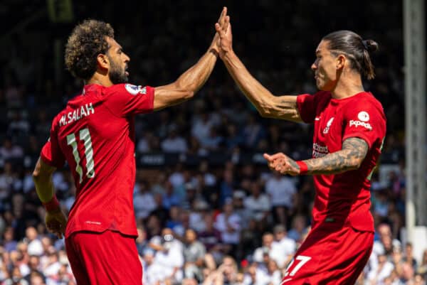 LONDON, ENGLAND - Saturday, August 6, 2022: Liverpool's Darwin Núñez (R) celebrates with team-mate Mohamed Salah after scoring his side's first goal to level the score 1-1 during the FA Premier League match between Fulham FC and Liverpool FC at Craven Cottage. (Pic by David Rawcliffe/Propaganda)