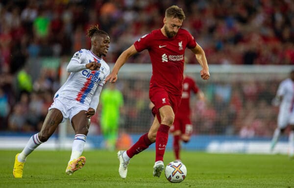 LIVERPOOL, ENGLAND - Monday, August 15, 2022: Liverpool's Nathaniel Phillips (R) and Crystal Palace's Wilfried Zaha during the FA Premier League match between Liverpool FC and Crystal Palace FC at Anfield. (Pic by David Rawcliffe/Propaganda)