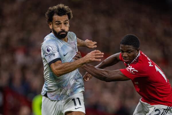 MANCHESTER, ENGLAND - Monday, August 22, 2022: Liverpool's Mohamed Salah (L) gets past Manchester United's Tyrell Malacia during the FA Premier League match between Manchester United FC and Liverpool FC at Old Trafford. (Pic by David Rawcliffe/Propaganda)