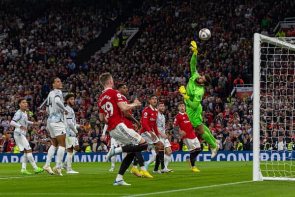 MANCHESTER, ENGLAND - Monday, August 22, 2022: Liverpool's goalkeeper Alisson Becker sees a Manchester United free-kick go over the bar during the FA Premier League match between Manchester United FC and Liverpool FC at Old Trafford. (Pic by David Rawcliffe/Propaganda)