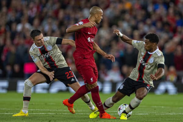 LIVERPOOL, ENGLAND - Tuesday, September 13, 2022: Liverpool's Fabio Henrique Tavares 'Fabinho' (C) is challenged by AFC Ajax's Steven Berghuis (L) and Jurriën Timber during the UEFA Champions League Group A matchday 2 game between Liverpool FC and AFC Ajax at Anfield. (Pic by David Rawcliffe/Propaganda)