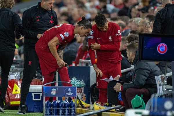 LIVERPOOL, ENGLAND - Tuesday, September 13, 2022: Liverpool's substitute Darwin Núñez and Roberto Firmino prepare to come on during the UEFA Champions League Group A matchday 2 game between Liverpool FC and AFC Ajax at Anfield. (Pic by David Rawcliffe/Propaganda)