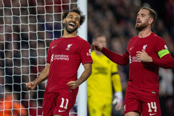 LIVERPOOL, ENGLAND - Tuesday, October 3, 2022: Liverpool's Mohamed Salah (L) celebrates with team-mate captain Jordan Henderson after scoring the second goal, from a penalty kick, during the UEFA Champions League Group A matchday 3 game between Liverpool FC and Glasgow Rangers FC at Anfield. (Pic by David Rawcliffe/Propaganda)