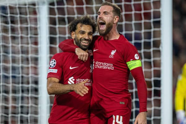 LIVERPOOL, ENGLAND - Tuesday, October 3, 2022: Liverpool's Mohamed Salah (L) celebrates with team-mate captain Jordan Henderson after scoring the second goal, from a penalty kick, during the UEFA Champions League Group A matchday 3 game between Liverpool FC and Glasgow Rangers FC at Anfield. (Pic by David Rawcliffe/Propaganda)