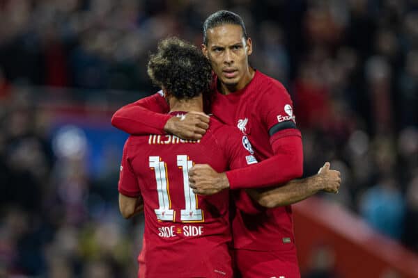 LIVERPOOL, ENGLAND - Tuesday, October 3, 2022: Liverpool's Mohamed Salah (L) celebrates with team-mate Virgil van Dijk after scoring the second goal, from a penalty kick, during the UEFA Champions League Group A matchday 3 game between Liverpool FC and Glasgow Rangers FC at Anfield. (Pic by David Rawcliffe/Propaganda)