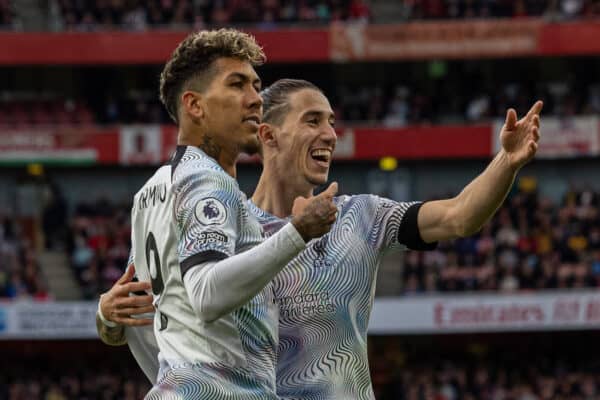 LONDON, ENGLAND - Sunday, October 9, 2022: Liverpool's Roberto Firmino (L) celebrates with team-mate Kostas Tsimikas after scoring his side's second equalising goal during the FA Premier League match between Arsenal FC and Liverpool FC at the Emirates Stadium. (Pic by David Rawcliffe/Propaganda)