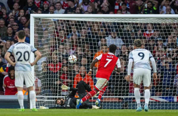 LONDON, ENGLAND - Sunday, October 9, 2022: Arsenal's Bukayo Saka scores the third goal past Liverpool's goalkeeper Alisson Becker from a penalty kick during the FA Premier League match between Arsenal FC and Liverpool FC at the Emirates Stadium. (Pic by David Rawcliffe/Propaganda)