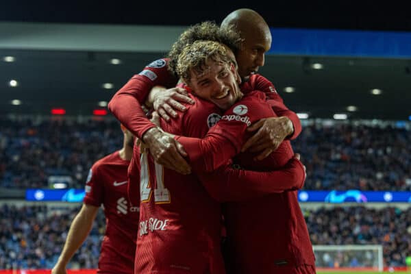 GLASGOW, SCOTLAND - Wednesday, October 12, 2022: Liverpool's Mohamed Salah (C) celebrates with team-mates Fabio Henrique Tavares 'Fabinho' and Harvey Elliott after scoring the fifth goal, completing his hat-trick, during the UEFA Champions League Group A matchday 4 game between Glasgow Rangers FC and Liverpool FC at Ibrox Stadium. (Pic by David Rawcliffe/Propaganda)