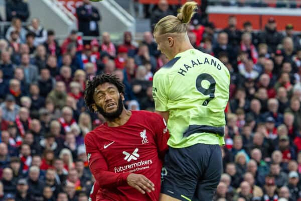 LIVERPOOL, ENGLAND - Sunday, October 16, 2022: Liverpool's Joe Gomez (L) challenges for a header with Manchester City's Erling Haaland during the FA Premier League match between Liverpool FC and Manchester City FC at Anfield. (Pic by David Rawcliffe/Propaganda)