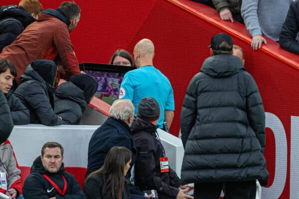 LIVERPOOL, ENGLAND - Sunday, October 16, 2022: Referee Anthony Taylor indicates a VAR review during the FA Premier League match between Liverpool FC and Manchester City FC at Anfield. (Pic by David Rawcliffe/Propaganda)