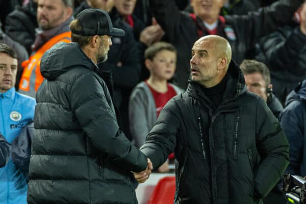 LIVERPOOL, ENGLAND - Sunday, October 16, 2022: Liverpool's manager Jürgen Klopp (L) and Manchester City's manager Josep 'Pep' Guardiola after the FA Premier League match between Liverpool FC and Manchester City FC at Anfield. (Pic by David Rawcliffe/Propaganda)