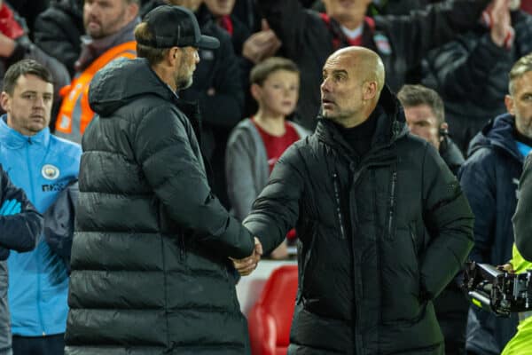 LIVERPOOL, ENGLAND - Sunday, October 16, 2022: Liverpool's manager Jürgen Klopp (L) and Manchester City's manager Josep 'Pep' Guardiola after the FA Premier League match between Liverpool FC and Manchester City FC at Anfield. (Pic by David Rawcliffe/Propaganda)