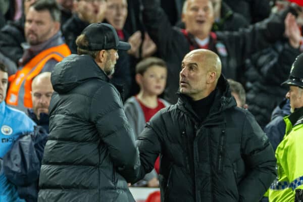 LIVERPOOL, ENGLAND - Sunday, October 16, 2022: Liverpool's manager Jürgen Klopp (L) and Manchester City's manager Josep 'Pep' Guardiola after the FA Premier League match between Liverpool FC and Manchester City FC at Anfield. (Pic by David Rawcliffe/Propaganda)