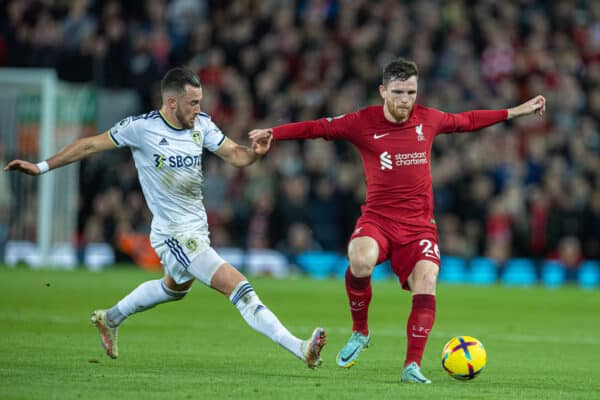 LIVERPOOL, ENGLAND - Saturday, October 29, 2022: Liverpool's Andy Robertson (R) is challenged by Leeds United's Jack Harrison during the FA Premier League match between Liverpool FC and Leeds United FC at Anfield. (Pic by David Rawcliffe/Propaganda)