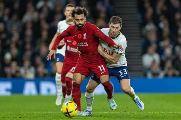 LONDON, ENGLAND - Sunday, November 6, 2022: Liverpool's Mohamed Salah is pulled back by Tottenham Hotspur's Ben Davies (R) during the FA Premier League match between Tottenham Hotspur FC and Liverpool FC at the Tottenham Hotspur Stadium. (Pic by David Rawcliffe/Propaganda)