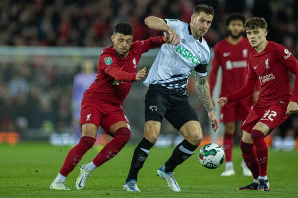 LIVERPOOL, ENGLAND - Wednesday, November 9, 2022: Derby County's James Collins (R) is challenged by Liverpool's Alex Oxlade-Chamberlain (L) during the Football League Cup 3rd Round match between Liverpool FC and Derby County FC at Anfield. (Pic by David Rawcliffe/Propaganda)