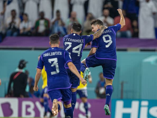 DOHA, QATAR - Wednesday, November 30, 2022: Argentina's Julián Álvarez (R) celebrates after scoring the second goal during the FIFA World Cup Qatar 2022 Group C match between Poland and Argentina at the Stadium 974. (Pic by David Rawcliffe/Propaganda)