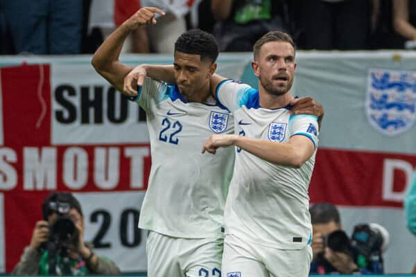 DOHA, QATAR - Sunday, December 4, 2022: England's Jordan Henderson (R) celebrates with team-mate Jude Bellingham after scoring the opening goal during the FIFA World Cup Qatar 2022 Round of 16 match between England and Senegal at the Al Bayt Stadium. (Pic by David Rawcliffe/Propaganda)
