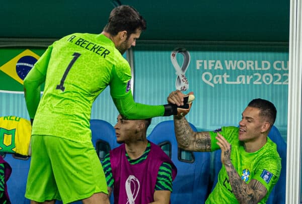 DOHA, QATAR - Monday, December 5, 2022: Brazil's goalkeeper Alisson Becker (L) shakes hands with goalkeeper Ederson Santana de Moraes after he was substituted during the FIFA World Cup Qatar 2022 Round of 16 match between Brazil and South Korea at the Stadium 974. (Pic by David Rawcliffe/Propaganda)