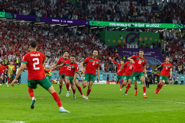 DOHA, QATAR - Tuesday, December 6, 2022: Morocco players celebrate after Achraf Hakimi scores the winning penalty in the shoot-out during the FIFA World Cup Qatar 2022 Round of 16 match between Morocco and Spain at the Education City Stadium. (Pic by David Rawcliffe/Propaganda)