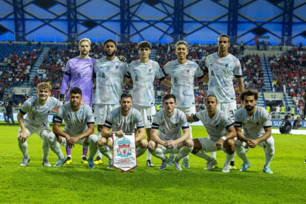 DUBAI, UNITED ARAB EMIRATES - Friday, December 16, 2022: Liverpool players line-up for a team group photograph before the Dubai Super Cup 2022 match between Liverpool FC and AC Milan at the Al Maktoum Stadium. Back row L-R: goalkeeper Caoimhin Kelleher, Joe Gomez, Stefan Bajcetic, Roberto Firmino, Joël Matip. Front row L-R: Harvey Elliott, Alex Oxlade-Chamberlain, James Milner, Andy Robertson, Thiago Alcântara, Mohamed Salah. (Pic by David Rawcliffe/Propaganda)