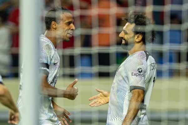 DUBAI, UNITED ARAB EMIRATES - Friday, December 16, 2022: Liverpool's Mohamed Salah (R) celebrates with team-mate Joël Matip (C) after scoring the opening goal during the Dubai Super Cup 2022 match between Liverpool FC and AC Milan at the Al Maktoum Stadium. (Pic by David Rawcliffe/Propaganda)