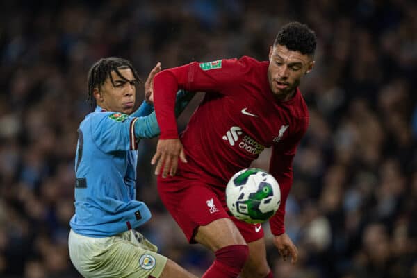 MANCHESTER, ENGLAND - Thursday, December 22, 2022: Liverpool's Alex Oxlade-Chamberlain (R) gets past Manchester City's Rico Mark Lewis during the Football League Cup 4th Round match between Manchester City FC and Liverpool FC at the City of Manchester Stadium. (Pic by David Rawcliffe/Propaganda)