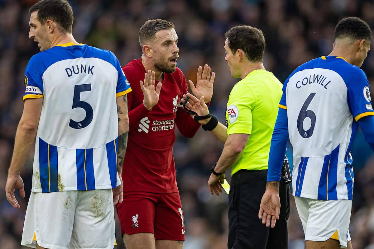 BRIGHTON & HOVE, ENGLAND - Saturday, January 14, 2023: Liverpool's captain Jordan Henderson is shown a yellow card by referee Darren England during the FA Premier League match between Brighton & Hove Albion FC and Liverpool FC at the Falmer Stadium. (Pic by David Rawcliffe/Propaganda)