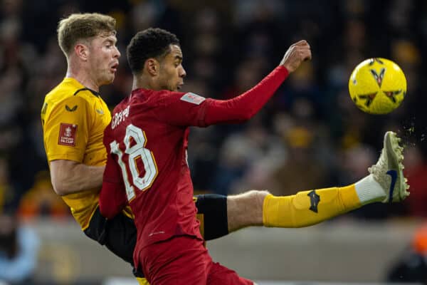 WOLVERHAMPTON, ENGLAND - Tuesday, January 17, 2023: Liverpool's Cody Gakpo (R) is challenged by Wolverhampton Wanderers' Nathan Collins during the FA Cup 3rd Round Replay match between Wolverhampton Wanderers FC and Liverpool FC at Molineux Stadium. (Pic by David Rawcliffe/Propaganda)