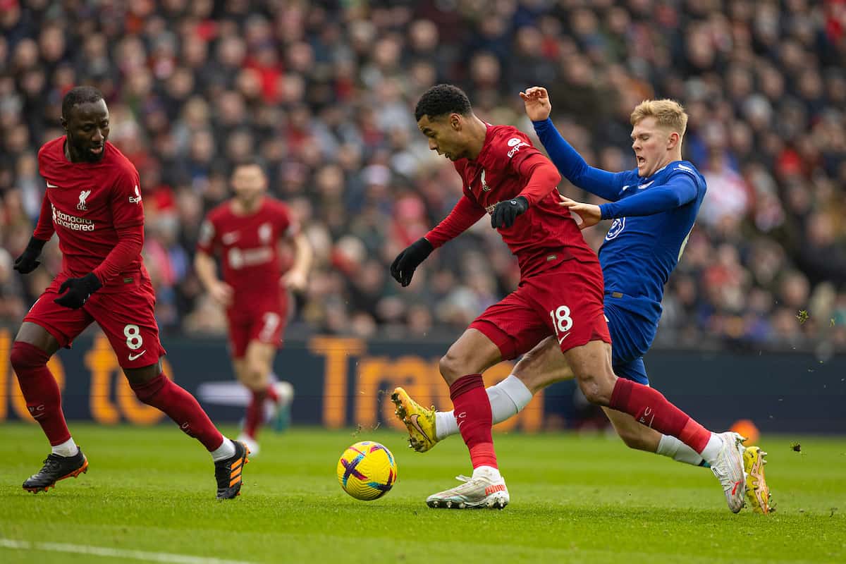 LIVERPOOL, ENGLAND - Saturday, January 21, 2023: Liverpool's Cody Gakpo is challenged by Chelsea's Lewis Hall (R) during the FA Premier League match between Liverpool FC and Chelsea FC at Anfield. (Pic by David Rawcliffe/Propaganda)