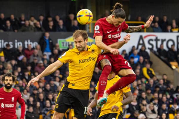 WOLVERHAMPTON, ENGLAND - Saturday, February 4, 2023: Liverpool's Darwin Núñez (R) challenges for a header with Wolverhampton Wanderers' Craig Dawson during the FA Premier League match between Wolverhampton Wanderers FC and Liverpool FC at Molineux Stadium. (Pic by David Rawcliffe/Propaganda)